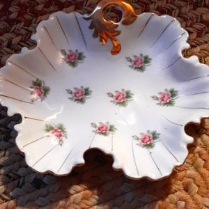 Porcelain candy dish. White with gold accents.